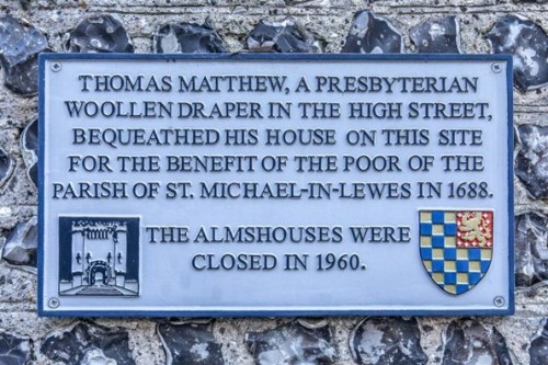 Historical plaque on St Michael's Court, Keere Street, Lewes, formerly almshouses