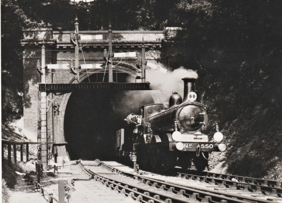 Goods train entering Lewes from tunnel, about 1910